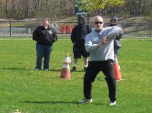World Tai Chi & Qigong Day; Diamond in the Pines, Coram NY (April 27, 2019): McElroy Laoshis contribution to this years Facilitators Demonstration included the Water Tiger School basic forms, Grasp Sparrows Tail to the Four Cardinal Directions and Dragon Strikes to the Four Diagonal Directions. He is pictured here in Elbow-Stroke from Dragon Strikes.