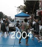 Village of Patchogue, Alive After Five (August 20, 2004): Push Hands and Pushing Staff demonstrations (from L to R) Paul Adago, Jr., & Ed O'Connell, Patricia Hsieh & Francesca DeStefano, Neal Stark & Laoshi Laurince McElroy.