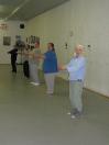 In the Kwoon (April 29, 2010): Margaret Bermel (R) playing Turn, Look, and Leave Behind, with arms in second position, from the Standing Eight Pieces of Brocade. 