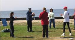 World T’ai Chi & Qigong Day; Shorefront Park, Patchogue NY (April 24, 2004): Dr. Ron Rebhuhn (in center with cap), from Westbury, leading the Primary Fragrance Qigong (or Xiang Gong) set.
