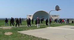 World Tai Chi & Qigong Day; Shorefront Park, Patchogue NY (April 26, 2008): A view of the variety that was available throughout the morning. Bob Klein, Long Island School of Tai-Chi-Chuan, is playing aspects of his original Zookinesis (foreground group Left); Nancy Fiano, Dojo of the Dancing Dragon, is leading participants in Silk Reeling Exercises (foreground group Right); Sifu Michael Evans, Shaolin Kung-fu Studios, is leading folks through the details of the 16-posture Yang-style Spear Set (background group Left); and Sifu Tyrone Wei Wicksman, Zhang Style Tai Chi Chuan, is introducing people to aspects of the Zhang-style form. Other workshops not pictured were led by Spencer Gee, Judith Budd-Walsh, and Laoshi Laurince McElroy.