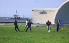 World Tai Chi & Qigong Day; Shorefront Park, Patchogue NY (April 26, 2008): Sifu Tyrone Wei Wicksman (2nd from Left in tan jacket), Zhang Style Tai Chi Chuan, leads people through the various postures of the Zhang-style form.