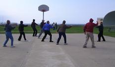 World Tai Chi & Qigong Day; Shorefront Park, Patchogue NY (April 26, 2008): Every year since 2002, Spencer Gee (R), Spencer Gee Wellness Corporation, has brought his very popular Tai Chi Workout to the event.