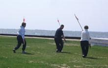 World Tai Chi & Qigong Day; Shorefront Park, Patchogue NY (April 26, 2008): People seemed a little hesitant to play with long pointy objects for the workshop on the 16-posture Yang-style Spear Set facilitated by Sifu Michael Evans (center), Shaolin Kung-fu Studios.