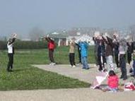 World Tai Chi & Qigong Day; Shorefront Park, Patchogue NY (April 25, 2009): Judith Budd-Walsh (L), Harmonious Movement of Hauppauge, leads a mixed-bag of play that included selections of Qigong from Nei Kung, Xi Jing Jing, Taoist breathing, and Bau Jing; and the Yang Long Form  first third.
