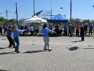 World Tai Chi & Qigong Day; Shorefront Park, Patchogue NY (April 24, 2010): Another view of the facilitators demonstration (L to R) Laoshi Laurince McElroy, Water Tiger School of Tai Chi Chuan of Patchogue; Sharon Infante, Music, Movement and More of Mt. Sinai; Jean Goulet and Bob Klein, Long Island School of Tai-Chi-Chuan; and Nancy Fiano, Dojo of the Dancing Dragon of Lindenhurst.
