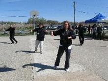 World Tai Chi and Qigong Day; Shorefront Park, Patchogue NY (April 28, 2012): During the Facilitators' Demonstration (L-R) Elan Abneri (Zhang Style Tai Chi Chuan) plays a cutting from his Zhang-Style Long Form, Bob Klein & Jean Goulet (Long Island School of Tai-Chi-Chuan) play their Yang-Style Short Form, and Sharon Infante (Music Movement and More) plays her Yang-Style Short Form.