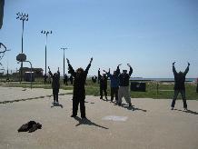 World Tai Chi & Qigong Day; Shorefront Park, Patchogue NY (April 28, 2012): From Qigong and aspects of her 24-Posture Form through exercises to help address Post-Traumatic Stress Disorder, Sharon Infante (C) from Movement Music and More in Mount Sinai takes participants through their paces.