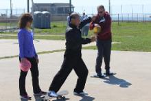 World Tai Chi & Qigong Day; Shorefront Park, Patchogue NY (May 3, 2014): Every year a new bag of toys comes to Shorefront Park with Spencer Gee (C), Spencer Gee Wellness Corporation in Old Westbury, and this year was no different! Photo by Joe Cavaliere, taichi-daily.com.
