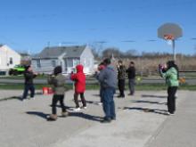 World Tai Chi & Qigong Day  Patchogue (April 25, 2015): Although Spencer Gee (L), Spencer Gee Wellness Corporation in Old Westbury, did bring the usual wide selection of toys for his annual Tai Chi Workout, it was his hat that got the most mention as the morning unfolded.