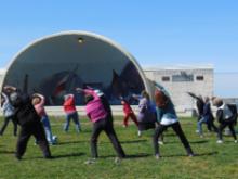 World Tai Chi & Qigong Day; Shorefront Park, Patchogue NY (April 30, 2016): Joseph Panico, West Babylon, warms up his group before introducing them to his lineage's 24-Posture Form.