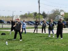 World Tai Chi & Qigong Day; Shorefront Park, Patchogue NY (April 29, 2017): Laoshi Laurince McElroy (Front), Water Tiger School of Tai Chi Chuan in Medford, introduces participants to the focus posture of his martial applications workshop: Wave Hands Like Clouds: A Portal to Self-Defense.