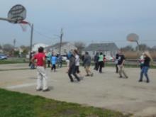 World Tai Chi & Qigong Day; Shorefront Park, Patchogue NY (April 29, 2017): In the second of their two different workshops for the morning, Bob and Jean Klein (C in red t-shirt and far R, respectively) from the Long Island School of T'ai-Chi-Chuan in Sound Beach, are helping people discover The Dance of the Tiger and Dragon in Tai-chi Forms.