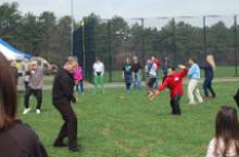 World Tai Chi & Qigong Day; Diamond in the Pines, Coram NY (April 28, 2018): As is now the tradition during the mornings break, facilitators showing the breadth and depth that is the art of Tai Chi Chuan during the group demonstration. (L to R) Laurince McElroy (in grey t-shirt, Water Tiger School), Elan Abneri (in black, Silent Fist Tai Chi), Joe Cronin (in blue and white sweater, Bethpage), Joseph Panico (in red, West Babylon), and Bob and Jean Klein (in light blue shirt and dark blue shirt, respectively, Long Island School of T'ai-Chi-Chuan). Not pictured are Maria DeAngelis Campanella (representing Spencer Gee Wellness Corporation), Bill Donnelly (Green Cloud Kung Fu), Joel Valerio (Staten Island). Judith Budd-Walsh (Harmonious Movement) was unable to participate in the demonstration this year.