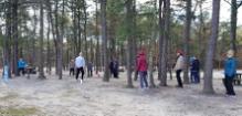 World Tai Chi & Qigong Day; Diamond in the Pines, Coram NY (April 27, 2019): Once again taking advantage of the plethora of pine trees surrounding the grounds of the complex, Laurince McElroy (C  in grey sweatshirt and facing away), Water Tiger School of Tai Chi Chuan in East Patchogue, brought back last years "Branching Out Your Energy Work: An Introduction to Arbor Qigong".