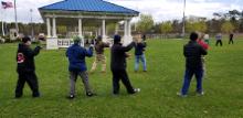 World Tai Chi & Qigong Day; Diamond in the Pines, Coram NY (April 27, 2019): Bob and Jean Klein (3rd from L in dark olive hoodie and 5th from in L in blue jacket, respectively), from the Long Island School of T'ai-Chi-Chuan in Sound Beach, helping people in "Generating Flows of Energy in the Yang Form to Heal the Body", their second of two workshops for the morning. Their earlier workshop was "Tiger Qigong".