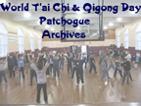 Hyperlink Tile identified as leading to the Archive for World T'ai Chi & Qigong Day Events, hosted by Water Tiger. Text over various groups of people in a gymnasium being led by different instructors in T'ai Chi & Qigong exercises.